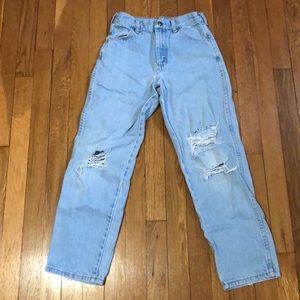 light blue mom jeans with rips on the knee & thigh